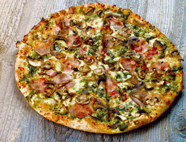istock Freshly Baked Mushrooms Pizza 1198687868