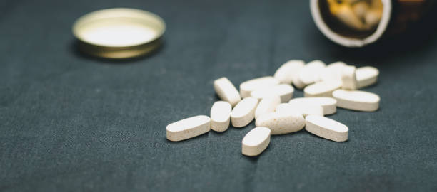 A lot of big white pills on a black background white pills
big white pills
A lot of pills big pharma stock pictures, royalty-free photos & images