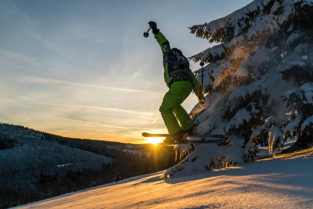 istock Downhill skier hitting a tree while jumping in beautiful powder snow and sunset conditions 1198696250