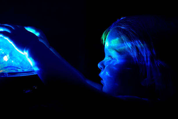 istock A little girl looks into a magic ball 1198696415