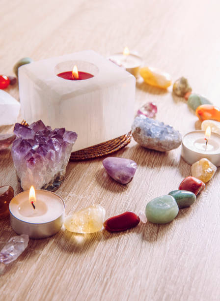 istock Setting up a semi precious stone crystal grid in home helps your intentions to manifest concept. Alternative lifestyle. 1198696421