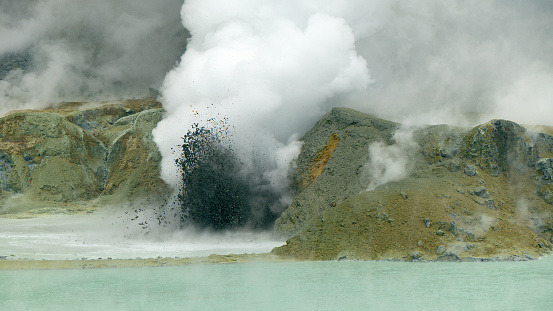 Eruption of mud in the crater of the White Island volcano in New Zealand. The photo was taken a few days before the eruption of December 9, 2019.