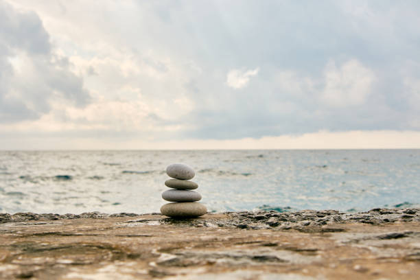 istock Balance, peace of mind, different sizes stones form a pyramid. 1198696538