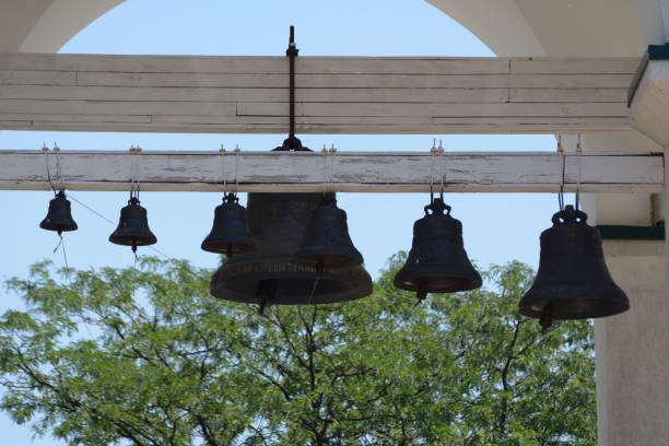 istock Different size church bells in a row in a white tower 1198697416