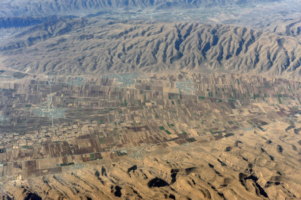 Mountain Terrain from the height. View stony mountains from the window  .