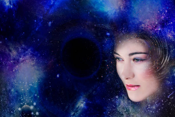 istock Woman looks into the blue space abyss 1198706356