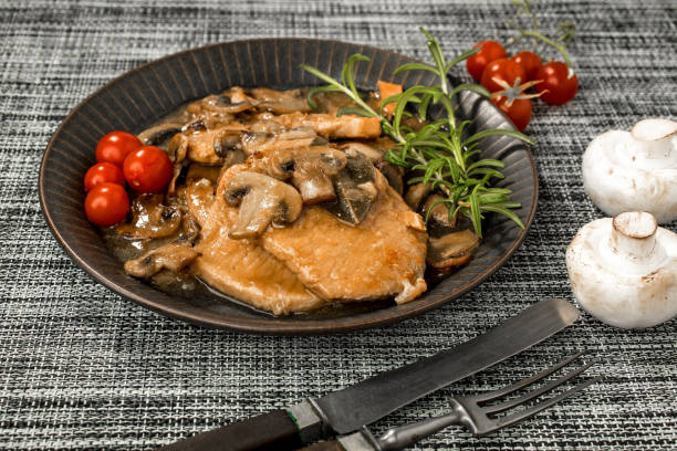 istock Braised pork chop with mushrooms. 1198707231