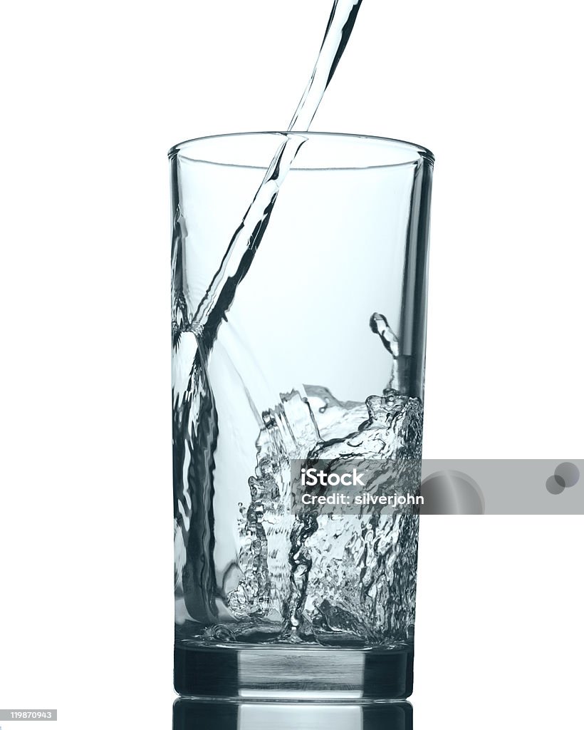 Pouring water into glass  Blue Stock Photo