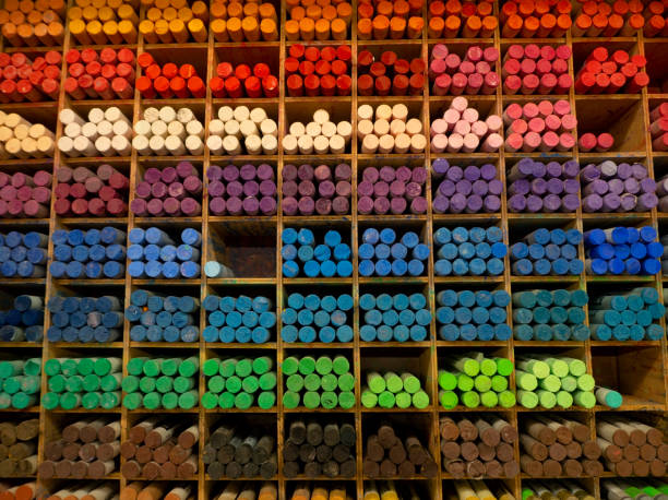 istock Assorted colored chalk crayons on an art shop shelf. 1198709722