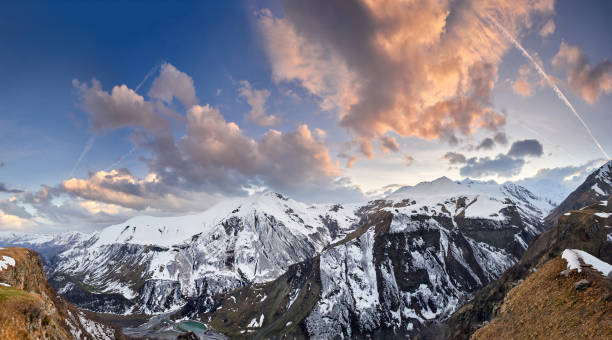 istock Panoramic mountain sunset. Caucasus Mountains, Georgia. View from ski resort Gudauri. 1198711001