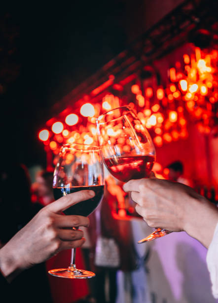 istock Couple toasting wine glasses 1198713103
