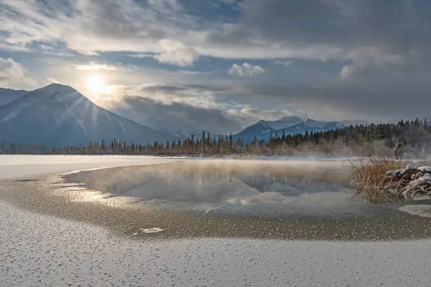 Mist from a sulphur spring at Vermilion Lakes in Banff National Park, Alberta, Canada