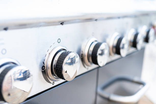 istock Close up of control knobs on an outdoor gas grill. 1198716054