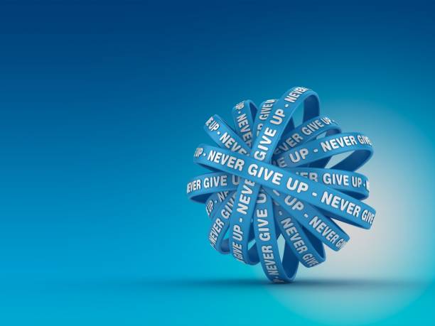 istock Circular Ribbons with NEVER GIVE UP Phrase - 3D Rendering 1198716414