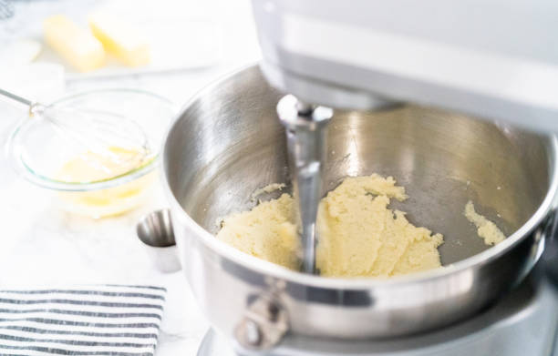istock Mixing ingredients in standing kitchen mixer to bake vanilla cupcakes. 1198721239