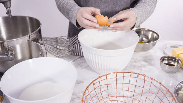 istock Mixing ingredients in standing kitchen mixer to bake funfetti cake. 1198721909