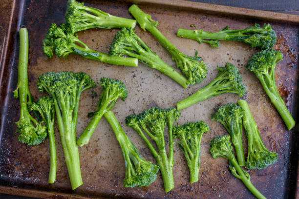 istock Raw Broccolini Tossed with Olive Oil on a Sheet Pan 1198723090