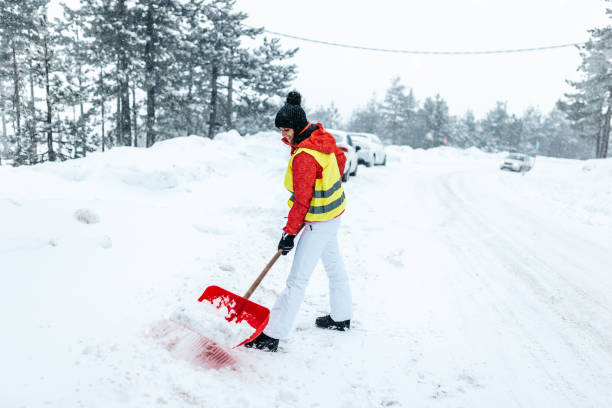 istock Snowy Road Shoveling 1198723100