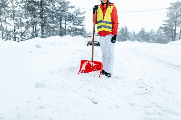 istock Snowy Road Shoveling 1198723245