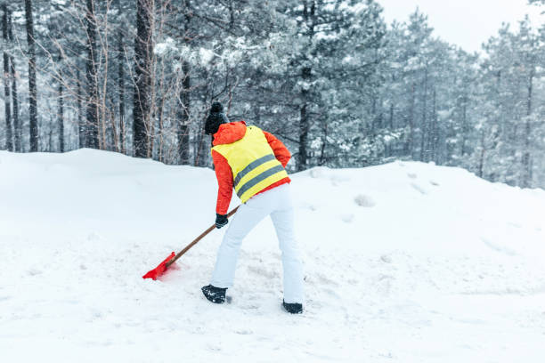 istock Snowy Road Shoveling 1198723826