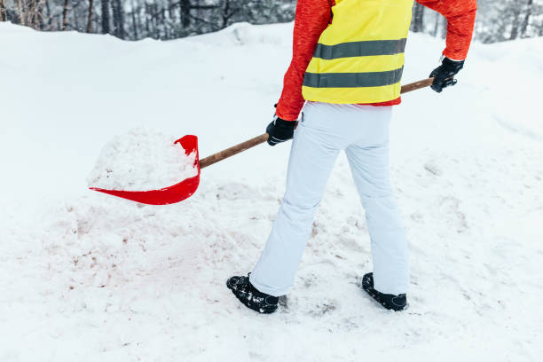 istock Snowy Road Shoveling 1198723914