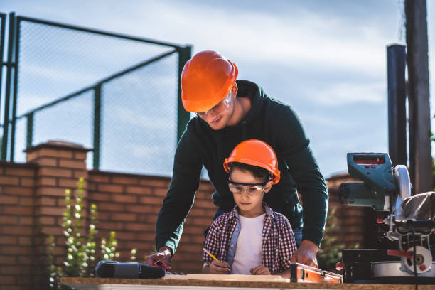 istock The father teaching his little son carpentry 1198728447