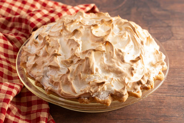 istock Chocolate Meringue Pie on a Rustic Wooden Table 1198732513