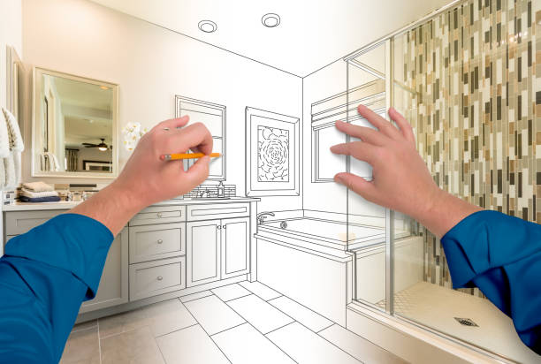 istock Male Hands Sketching Beautiful Custom Bathroom Gradating to Finished Construction 1198734624