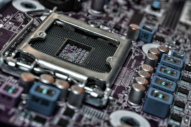 istock Detail of cpu socket on a modern computer motherboard. Electronic small component details. 1198734744