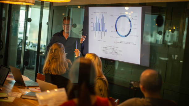 istock Caucasian man giving a financial presentation 1198734914