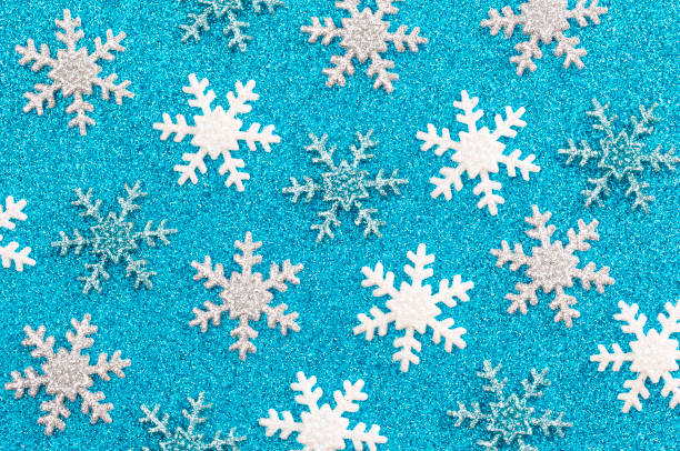 istock Background of Winter Glitter Snow Flakes 1198734983