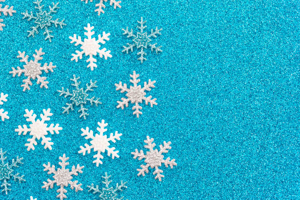 istock Background of Winter Glitter Snow Flakes 1198734984