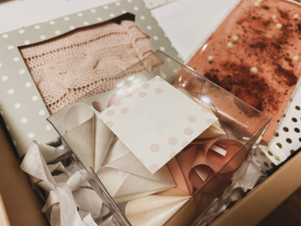 istock gift set in a pink box with a notebook, pen, chocolate bar and fortune cookies 1198737671