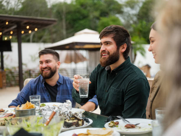 istock Friends eating mexican barbecue 1198738292