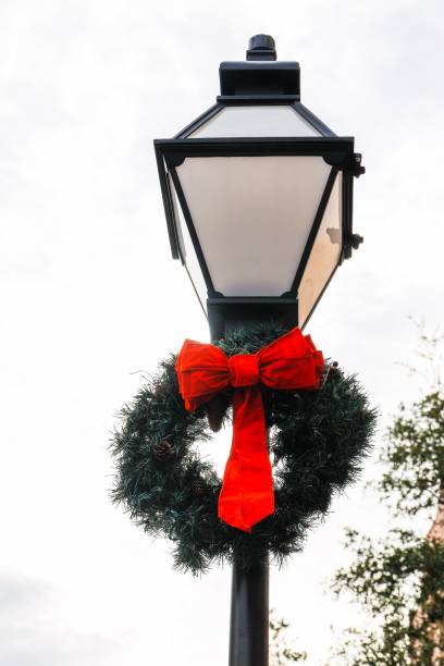 istock Lamp post with holiday wreath 1198739569