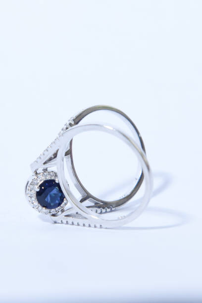 istock woman silver ring with Blue sapphire stone 1198740464