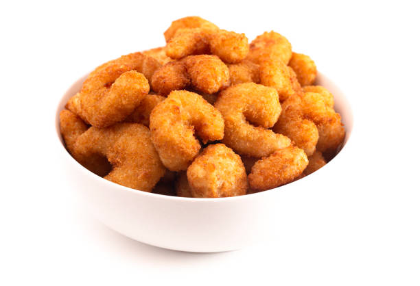 istock Bowl of Popcorn Shrimp Isolated on a White Background 1198740516