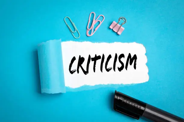 Photo of Criticism. Diversity of views, beliefs, thoughts and disagreements concept