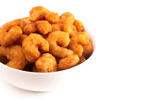 istock Bowl of Popcorn Shrimp Isolated on a White Background 1198740685