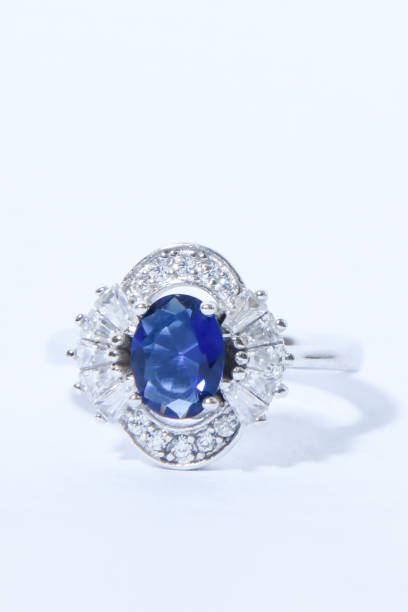 istock woman silver ring with Blue sapphire stone 1198741479