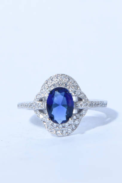 istock woman silver ring with Blue sapphire stone 1198742227