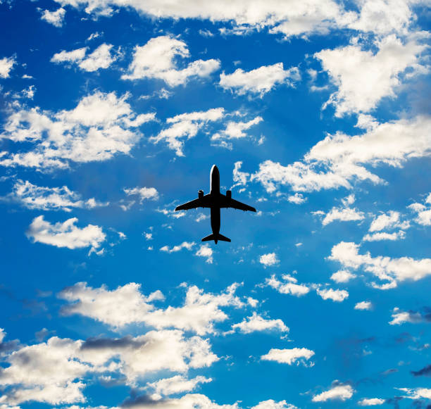 istock Commercial aircraft is flying above 1198742230