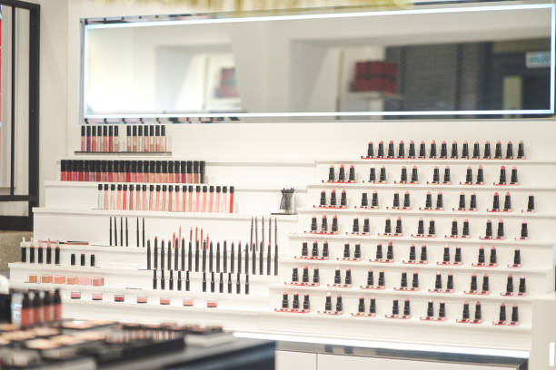 istock Stand with professional cosmetics and makeup products 1198743176