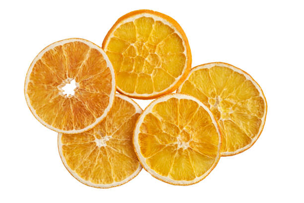 istock Stack of dried orange slices isolated on white 1198743894