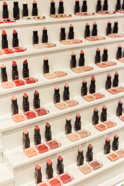 istock Lipstick nude shades. Rack with professional makeup for make up artists 1198744836