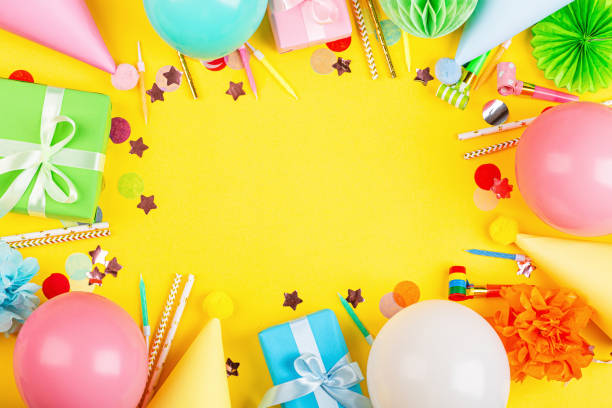 istock Birthday decor on yellow background, top view. Flat lay style. Mockup, template 1198745038