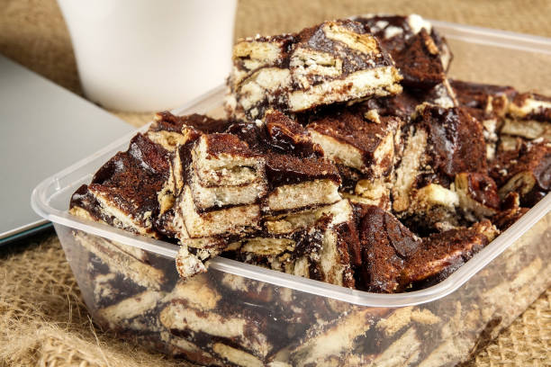istock Chocolate brownies with coffee on a rug background. 1198745881