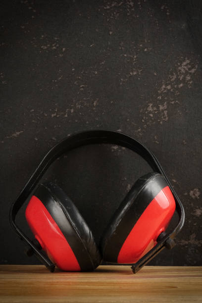 istock Safety Personal Protective Equipment(PPE) on a rustic black background. 1198746635