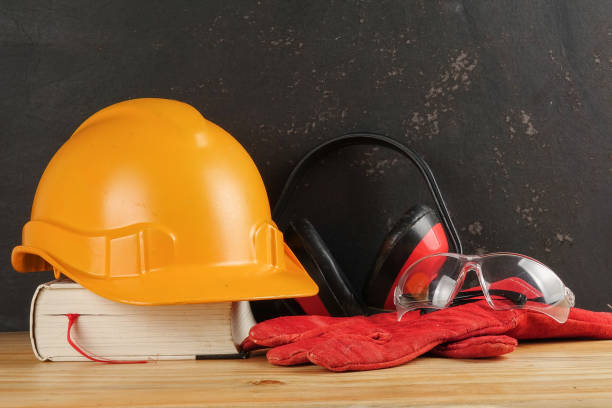 istock Safety Personal Protective Equipment(PPE) on a rustic black background. 1198746654