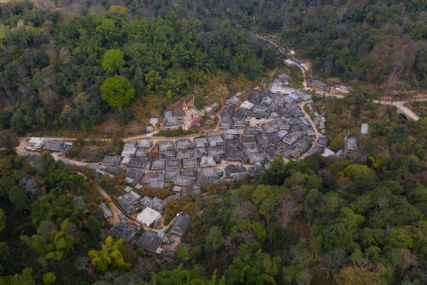 Aerial view of the remote Nuogang Dai village in Lancang, Yunnan - China Aerial view of the remote Nuogang Dai village in Lancang, Yunnan - China xishuangbanna stock pictures, royalty-free photos & images